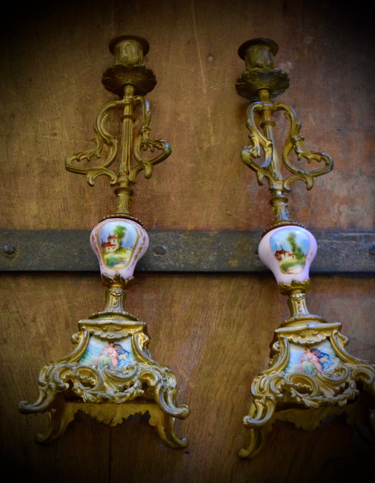 A Pair of French Antique Candle Sticks with Hand Painted Sevres Porcelain.         Sku: C500